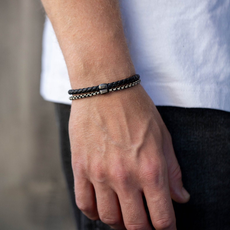 A double men bracelet with black leather cord and oxidized sterling silver chain