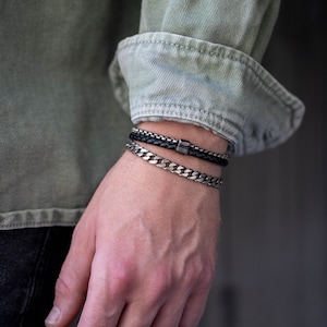 Combination of sterling silver and black leather cord bracelets for him