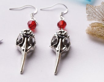 Silver  bird skull earrings with red beads
