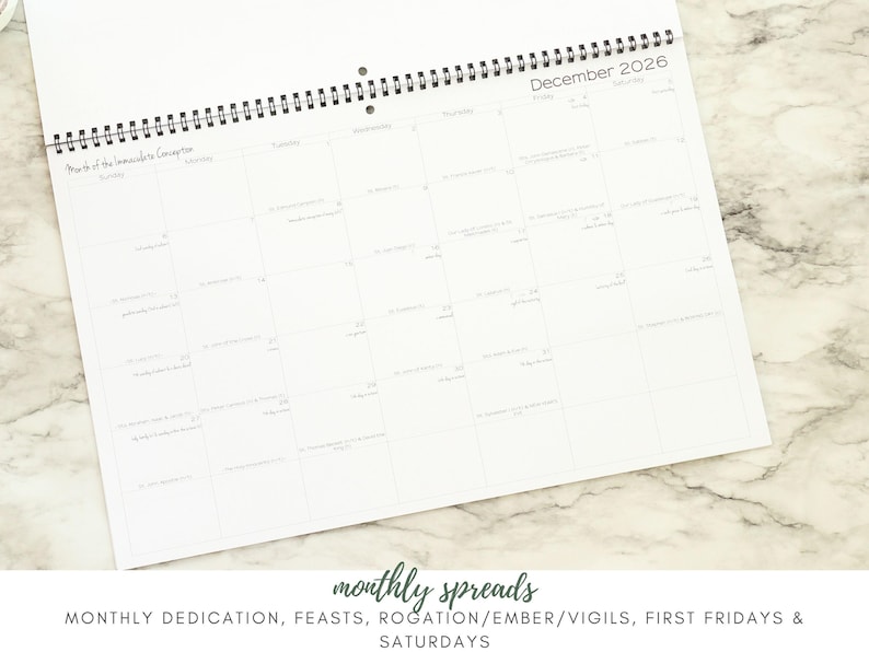 May include: A white, spiral-bound calendar open to December 2026. The calendar features a grid layout with dates and space for notes. The text "monthly spreads" and a list of events are at the bottom.