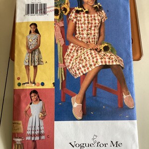 Vogue/Butterick 9417  “Vogue for Me” girl’s dress pattern, sizes 7,8, 10