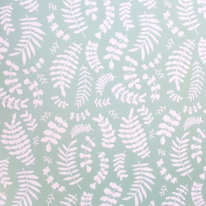 May include: A seamless pattern of white stylised leaves on a light blue background.