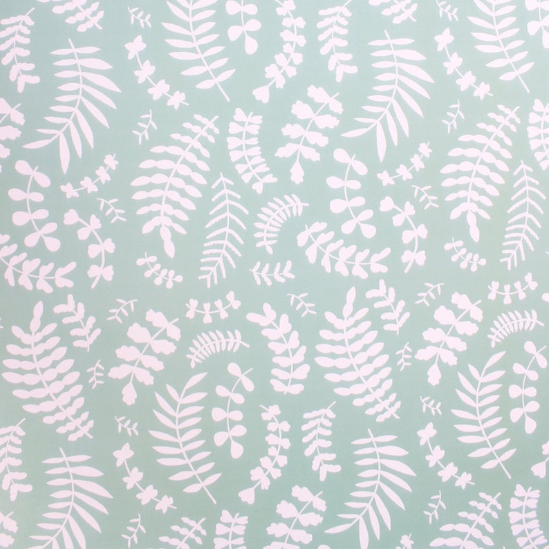 May include: A seamless pattern of white stylised leaves on a light blue background.