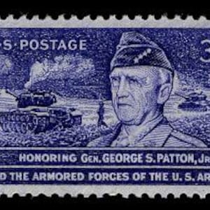 May include: A blue postage stamp honoring General George S. Patton, Jr. and the Armored Forces of the U.S. Army. The stamp features a portrait of Patton and two tanks in the background.