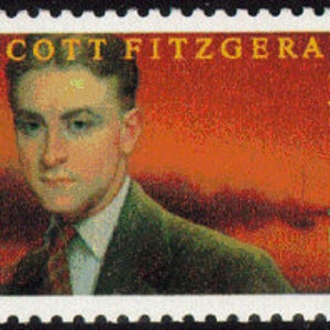 May include: A red, white, and blue postage stamp featuring a portrait of F. Scott Fitzgerald. The stamp is labeled "23 USA".