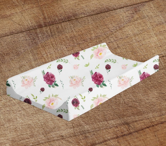 Mauve changing pad cover top