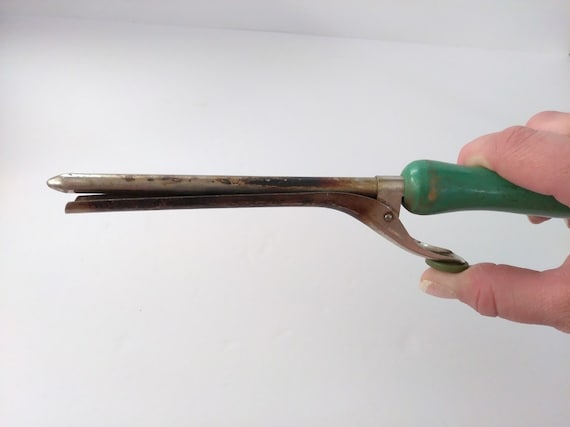 old fashioned curling iron