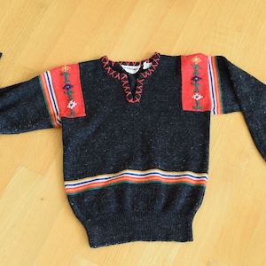 Vintage 60&#39;s Acrylic and Nylon Sweater Black with Jacket Waist Rainbow Stripes on Shoulders and Waist also Red Panels with Flower Embroidery