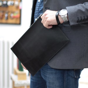 Black leather clutch bag for men