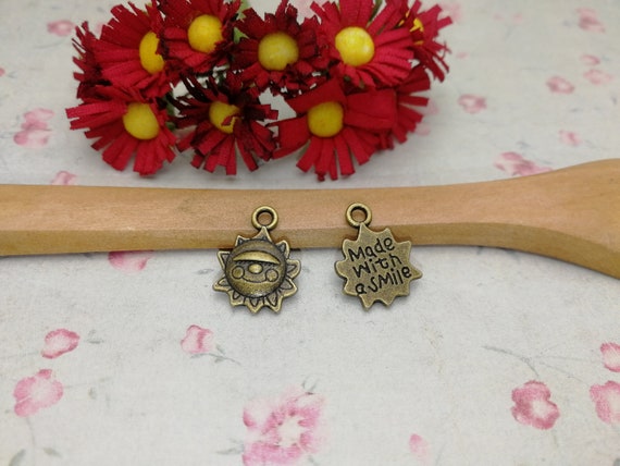 30/100 Pieces Metal Sun Pendant Necklace Earring Keychain 30/100 Pieces Metal Sun Pendant Necklace Earring Keychain
