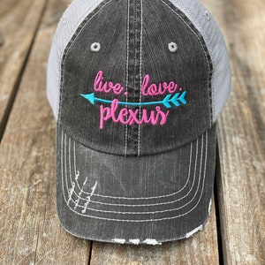 Plexus Arrow Trucker Hat