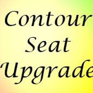 May include: Contour Seat Upgrade. A close-up of a seat with a contoured design. The seat is made of a soft, comfortable material and is designed to provide support and comfort.