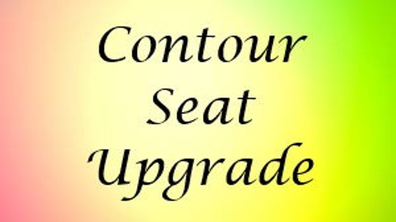 May include: Contour Seat Upgrade. A close-up of a seat with a contoured design. The seat is made of a soft, comfortable material and is designed to provide support and comfort.