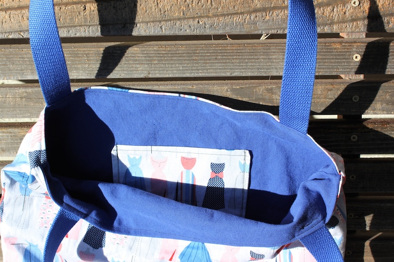 shopping Dresses on a mannequin fabric tote bag diapers or overnight bag Canvas lined and bottom books Great for groceries lunch