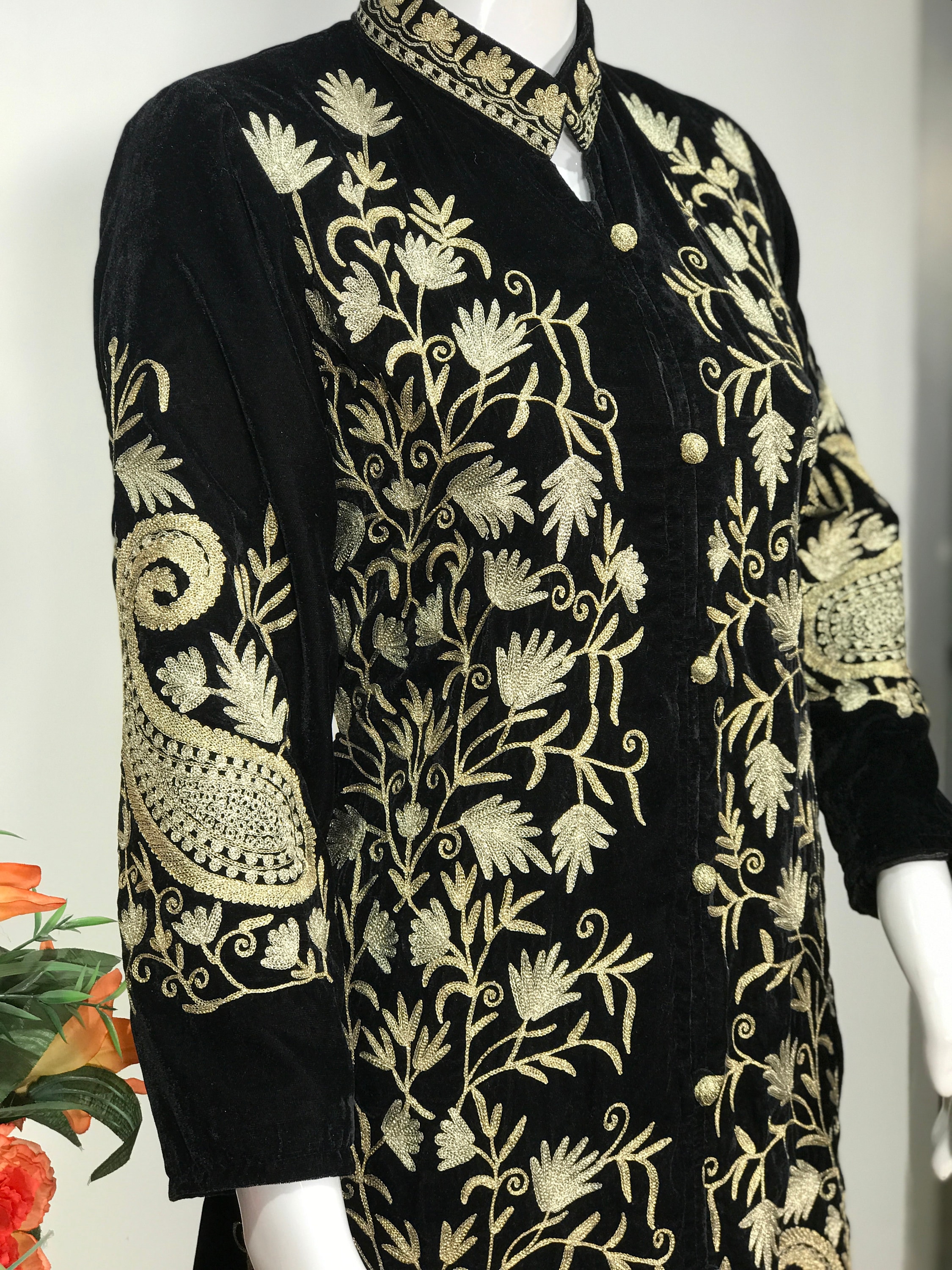 black embroidered coat