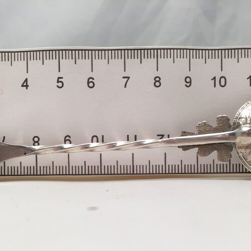 Antique silver coin shops spoon