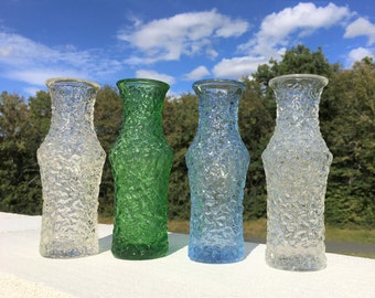 A collection of four mid-century Sklo-Union Czech glass vases