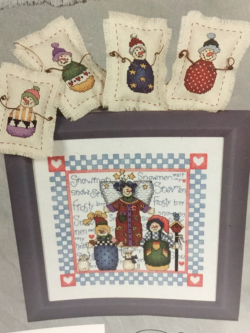 Snow folks at Home Counted cross stitch pattern book from Jeanette Crews Designs