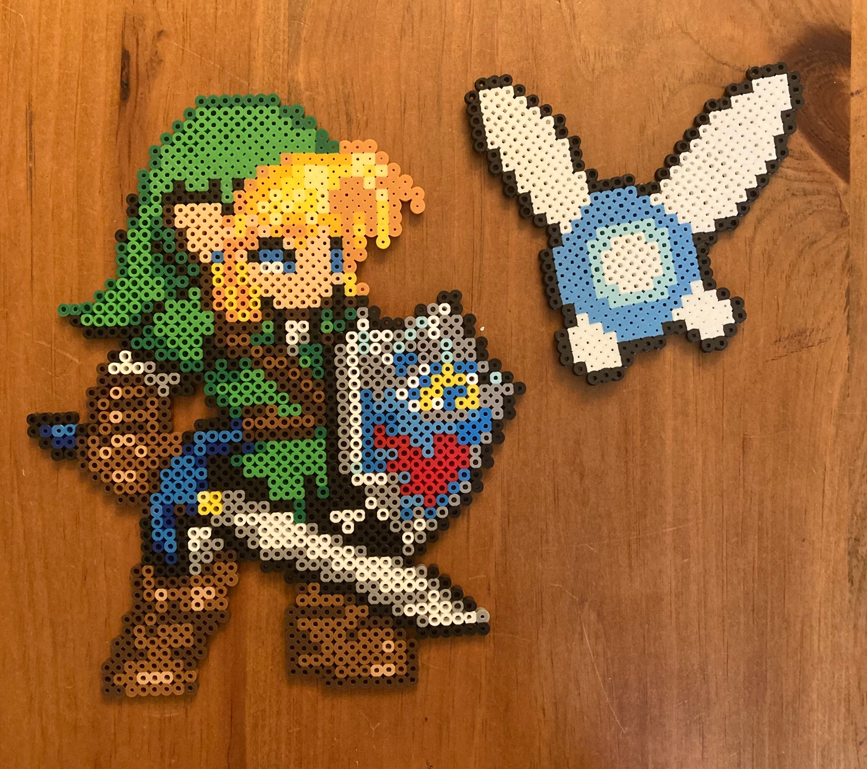 I got a perler bead kit for Christmas so I made BOTW Link and BOTW2 Zelda :  r/beadsprites