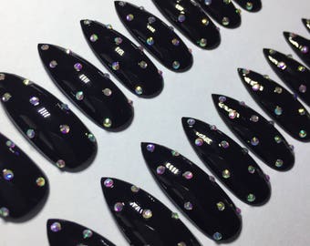 False nails - extra long black stiletto full cover press on nails with iridescent crystals.