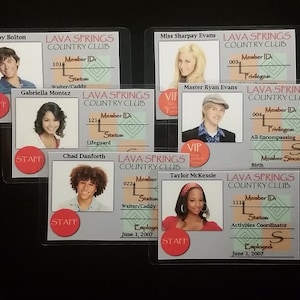 May include: Six plastic ID cards with photos of people and text that reads "Lava Springs Country Club". The cards have different member IDs and job titles, such as "Lifeguard", "Walter/Caddy", and "Activities Coordinator".