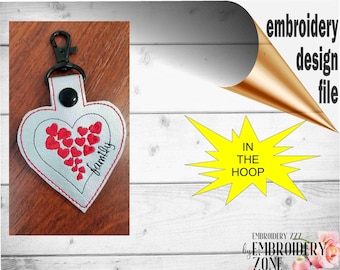 family heart shaped snap tab key fob design. Embroidery in the hoop key chain template for machine embroidery.