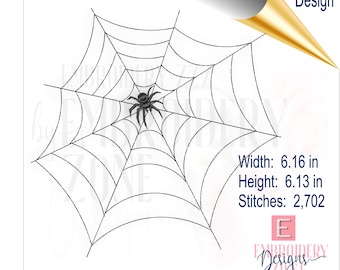 May include: Black and white embroidery design of a spider and its web. The spider is centered in the web. The design is 6.16 inches wide and 6.13 inches high. The design has 2,702 stitches. The text "Embroidery Design" is at the top.