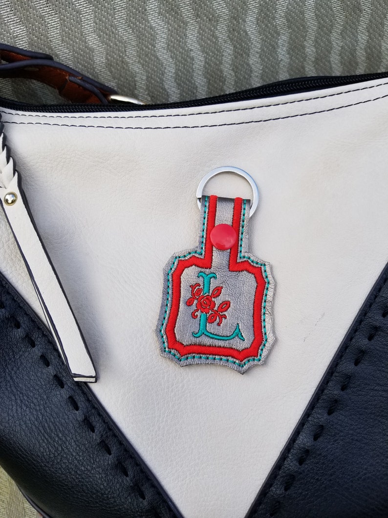 Monogram Letter L snap tab in the hoop key fob embroidery design template for making your own key chain ITH.