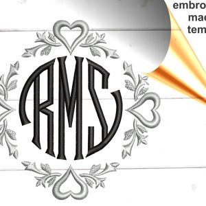 May include: A black and white embroidery design featuring a monogram with the letters "RMS" surrounded by a decorative border of hearts and leaves.