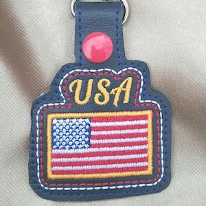 ITH USA Flag snap tab embroidery design. American flag  key chain pattern file. Brother machine flag in the hoop project,