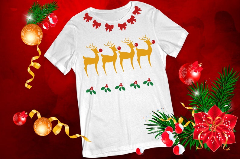 May include: White t-shirt with a Christmas design featuring four reindeer with red noses and holly leaves. The reindeer are in a line and are facing to the right. The shirt has a white background and the design is in red, green, and yellow.
