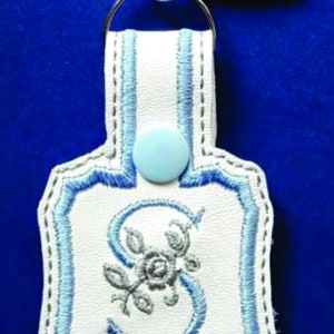 Monogram Letter S snap tab in the hoop key fob embroidery design template for making your own key chain ITH. Machine Embroidery fob pattern