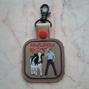 Farm boy embroidery pattern snap-tab in the hoop. ith key fob dairy cow design, western key chain 4-H gift idea, farmer template, rodeo image 1