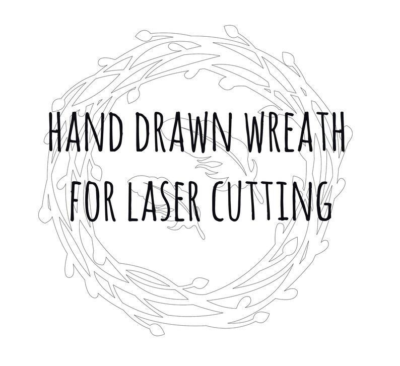 May include: A black and white line drawing of a wreath with the text "HAND DRAWN WREATH FOR LASER CUTTING" in the center.