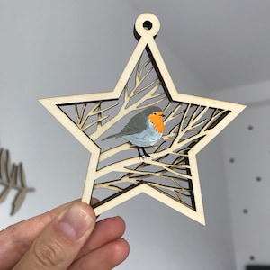 Ornamenti di uccelli Robin in stella per decorazioni natalizie File tagliati al laser, decorazioni laser natalizie in formato SVG, file cnc stella albero di Natale multistrato