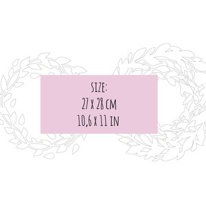 May include: A black and white illustration of a leafy wreath in the shape of an infinity symbol. The wreath is on a white background with a pink rectangle that says "SIZE: 27 x 28 CM 10,6 x 11 IN".