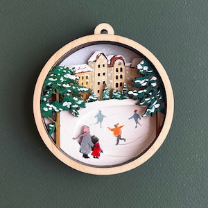 Patinaje Pista de hielo decoración de invierno globo de nieve adorno archivos cortados con láser