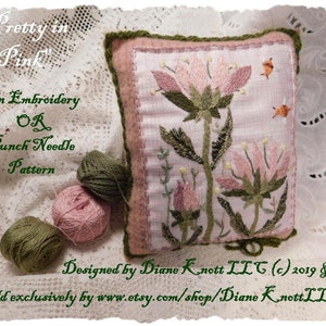 May include: An embroidery or punch needle pattern titled "Pretty in Pink" featuring a pink flower with green leaves on a light pink fabric background. The pattern is designed by Diane Knott LLC and sold exclusively on Etsy.