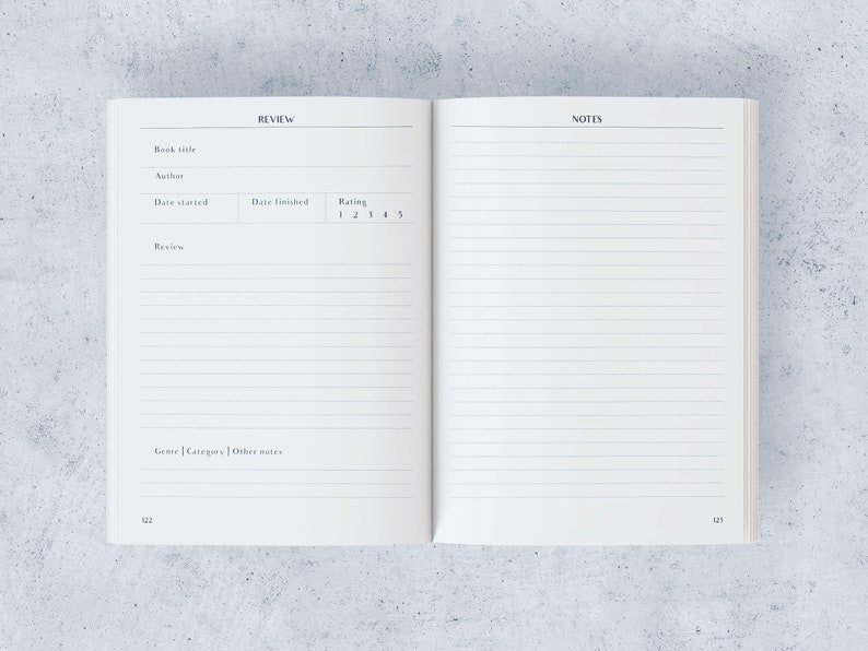May include: An open notebook with white lined pages. The left page has headings for "REVIEW" and fields for book details, including title, author, and rating. The right page is blank, with the heading "NOTES." The background is a light grey.
