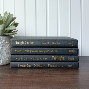 Collection of Seven Hardcover Books in Black Bindings - Free