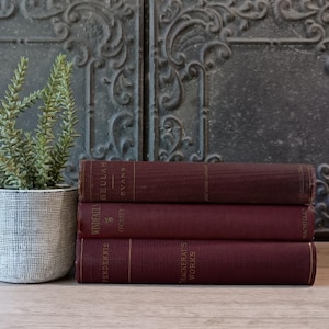 Vintage Red Books, Old Book Stack, Christmas Inspired Home Decor, Decorative Books, Home Staging