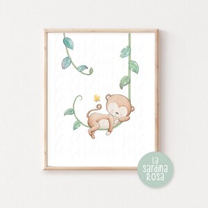 May include: A watercolor illustration of a brown monkey sleeping on a vine with green leaves. A yellow butterfly is flying near the monkey. The illustration is framed in a light brown frame. The text "La Sardina Rosa" is in the bottom right corner of the image.