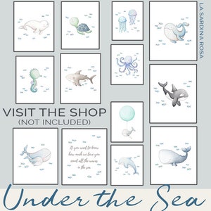 May include: A set of 10 printable nursery art prints featuring various sea creatures, including a whale, a seahorse, a turtle, a jellyfish, an octopus, and a shark. The prints are in a watercolor style and have a light blue background with white outlines. The text "Under the Sea" is written at the bottom of the image.