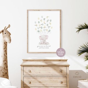 May include: A printable baby shower guest book featuring a cute pink elephant surrounded by green and yellow balloons. The text reads "You are so loved, Little One".