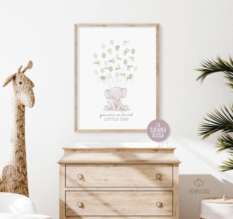 May include: A printable baby shower guest book featuring a cute pink elephant surrounded by green and yellow balloons. The text reads "You are so loved, Little One".