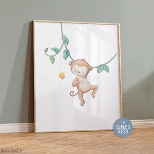 May include: A watercolor illustration of a brown monkey hanging from a vine with green leaves. A yellow butterfly is flying nearby. The illustration is on a white background with the text "La Sardina Rosa" in the bottom right corner.