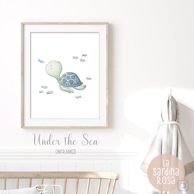 May include: A watercolor illustration of a green sea turtle swimming with blue fish. The image is titled "Under the Sea" and is unframed.