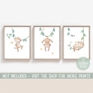 May include: Three framed prints with watercolor illustrations of monkeys swinging on vines. The monkeys are brown with light brown fur and have light brown eyes. The vines are green with light green leaves. The prints are set against a white background. The text "La sardina Rosa" is in the bottom right corner of the image.