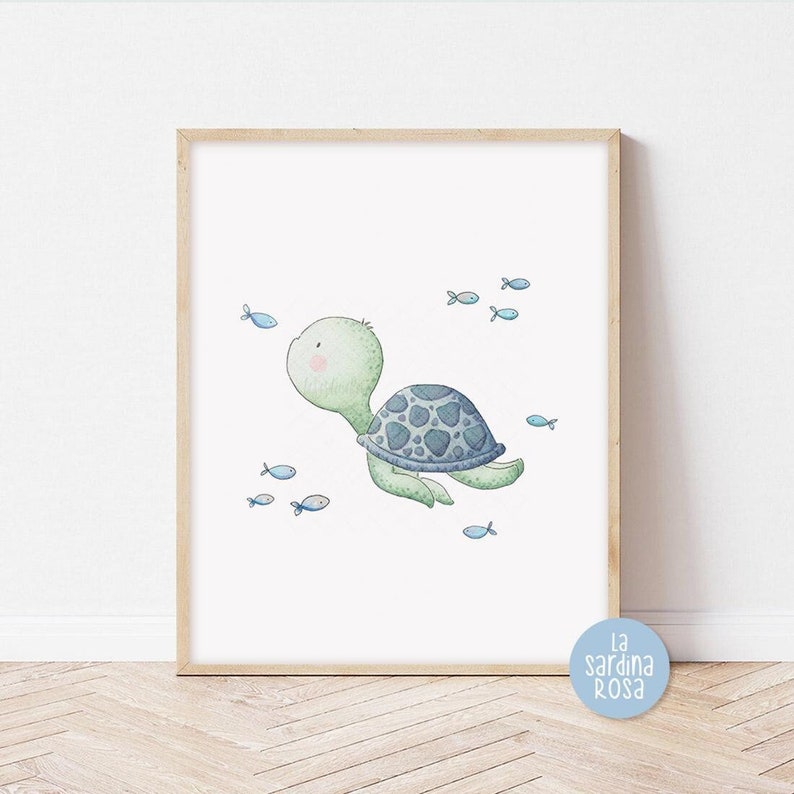 May include: A watercolor illustration of a green sea turtle swimming with blue fish. The turtle has a blue and gray shell and is looking up at the fish. The background is white.