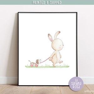 May include: A watercolor illustration of a brown bunny rabbit walking a small brown and white dog on a leash. The bunny is wearing a pink collar and the dog is wearing a red collar. The background is a light green.